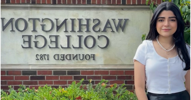 Denisse Rojas Maldonado in front of Washington College entrance